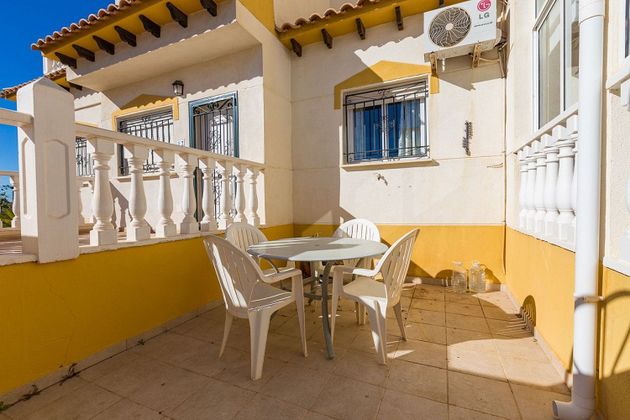 Foto 2 de Casa adossada en venda a calle Trepadora de 2 habitacions amb terrassa i piscina
