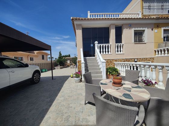 Foto 1 de Casa adosada en venta en Nueva Torrevieja - Aguas Nuevas de 3 habitaciones con terraza y piscina