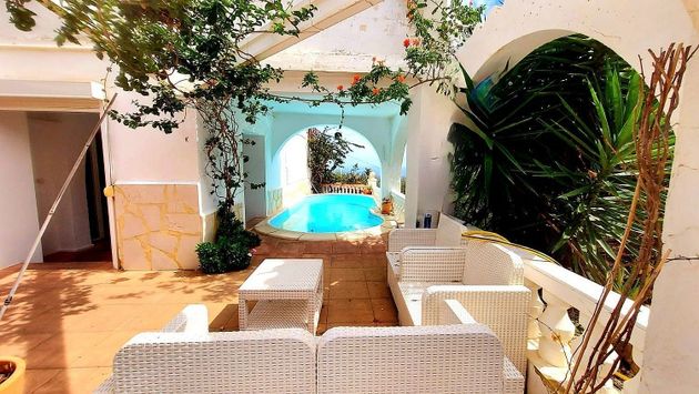Foto 1 de Casa en venda a Benimantell de 2 habitacions amb terrassa i piscina