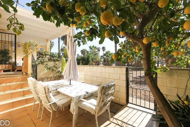 Foto 1 de Venta de casa adosada en calle Portugal de 3 habitaciones con terraza y jardín
