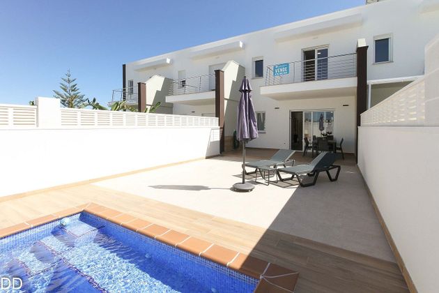 Foto 1 de Casa en venta en calle Pedreguer de 3 habitaciones con terraza y piscina