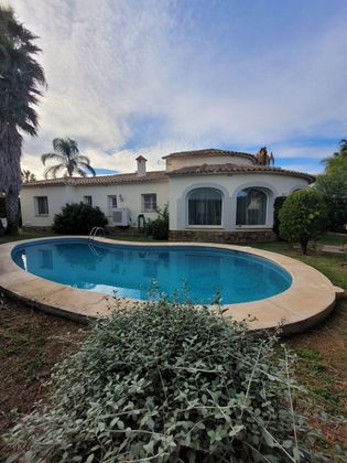 Foto 1 de Alquiler de casa en Oliva Nova de 3 habitaciones con terraza y piscina