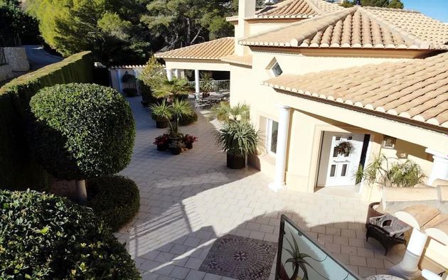 Foto 1 de Venta de chalet en Pedreguer de 4 habitaciones con terraza y piscina