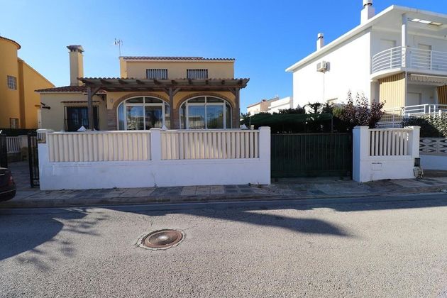 Foto 2 de Chalet en venta en Oliva Playa de 5 habitaciones con terraza y piscina