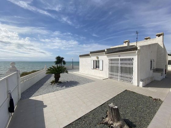 Foto 1 de Casa en venda a Les Cases d'Alcanar de 3 habitacions amb terrassa i piscina