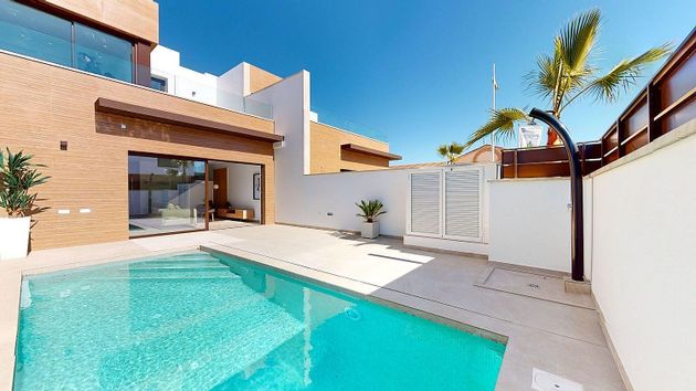 Foto 1 de Casa adossada en venda a Algorfa de 4 habitacions amb terrassa i piscina
