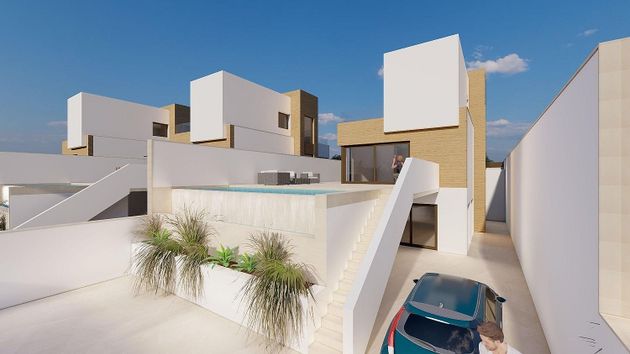 Foto 2 de Casa adosada en venta en Algorfa de 4 habitaciones con terraza y piscina