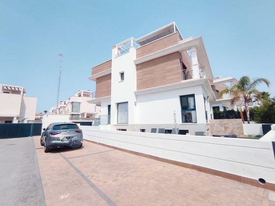 Foto 1 de Casa adosada en venta en Ciudad Quesada de 4 habitaciones con terraza y piscina