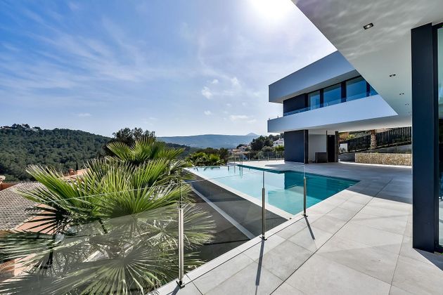 Foto 2 de Casa en venta en Partides comunes - Adsubia de 3 habitaciones con terraza y piscina