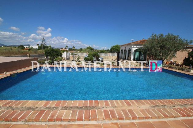 Foto 2 de Venta de casa rural en Oliva Nova de 3 habitaciones con terraza y piscina