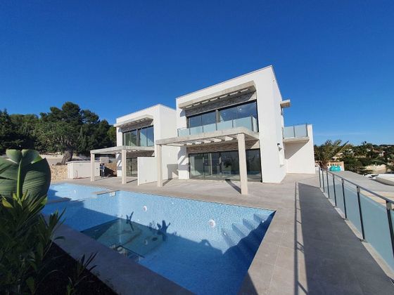 Foto 1 de Venta de casa adosada en Pinar del Advocat - Cometa de 3 habitaciones con terraza y piscina