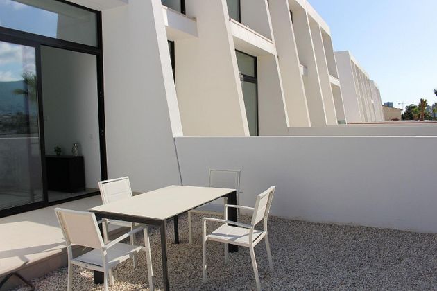 Foto 1 de Casa adossada en venda a Zona Levante - Playa Fossa de 3 habitacions amb piscina i calefacció