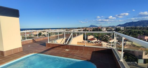Foto 1 de Venta de ático en Oliva Nova de 2 habitaciones con terraza y piscina