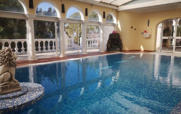 Foto 1 de Venta de chalet en El Montgó de 5 habitaciones con terraza y piscina