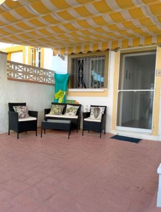 Foto 1 de Casa adossada en venda a avenida De Saragossa de 3 habitacions amb terrassa i piscina