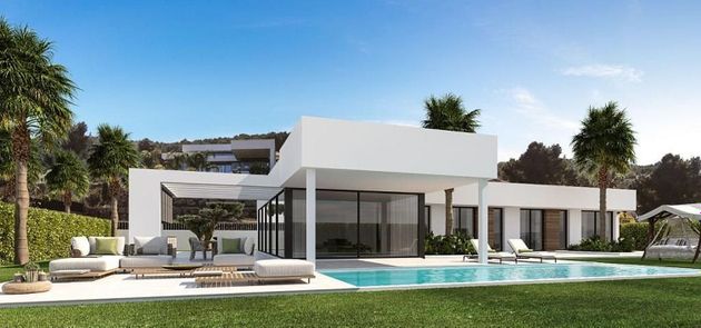 Foto 2 de Casa en venta en Partides comunes - Adsubia de 3 habitaciones con terraza y piscina