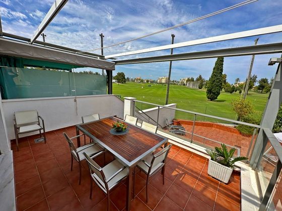 Foto 1 de Venta de casa en Oliva Nova de 4 habitaciones con terraza y piscina