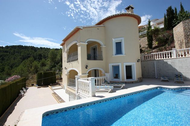 Foto 1 de Chalet en venta en Orba de 4 habitaciones con terraza y piscina
