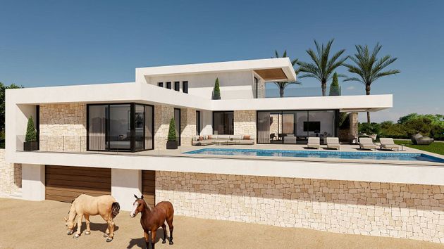 Foto 1 de Xalet en venda a Beniarbeig de 4 habitacions amb terrassa i piscina