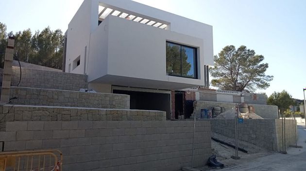 Foto 1 de Venta de casa en Pinar del Advocat - Cometa de 4 habitaciones con terraza y piscina