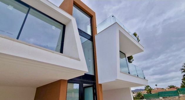 Foto 1 de Venta de casa adosada en Zona Levante - Playa Fossa de 3 habitaciones con terraza y piscina