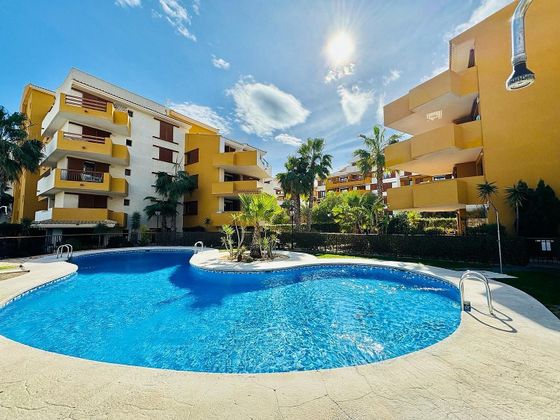 Foto 1 de Piso en venta en urbanización Punta Prima de 2 habitaciones con terraza y piscina