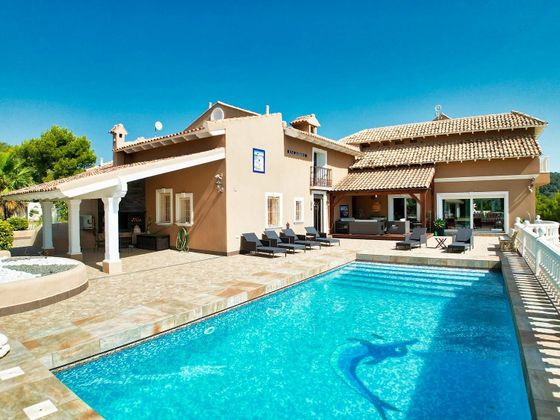 Foto 2 de Casa en venta en Nucia (la) de 8 habitaciones con piscina y jardín