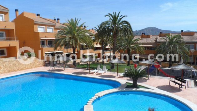 Foto 1 de Casa adossada en lloguer a Monforte del Cid de 4 habitacions amb terrassa i piscina
