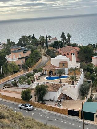 Foto 1 de Chalet en venta en Pueblo Español-Coveta Fumá de 6 habitaciones con terraza y piscina
