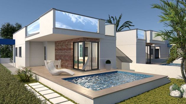 Foto 1 de Casa adossada en venda a calle Beniarbeig de 3 habitacions amb terrassa i piscina