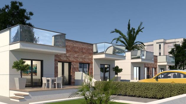 Foto 2 de Casa adossada en venda a calle Beniarbeig de 3 habitacions amb terrassa i piscina
