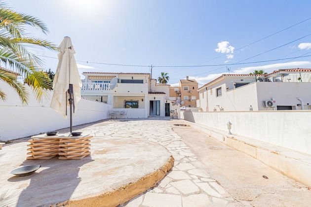 Foto 1 de Venta de casa adosada en L'Albir-Zona Playa de 6 habitaciones con terraza y aire acondicionado