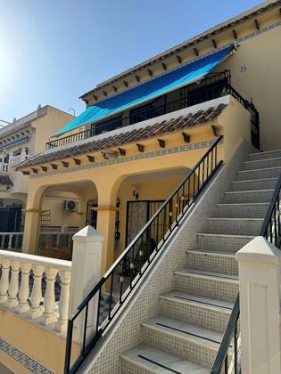 Foto 1 de Venta de casa adosada en Torrelamata - La Mata de 2 habitaciones con terraza y balcón