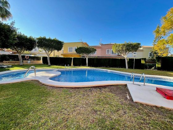 Foto 1 de Venta de casa adosada en L'Albir-Zona Playa de 3 habitaciones con piscina y jardín