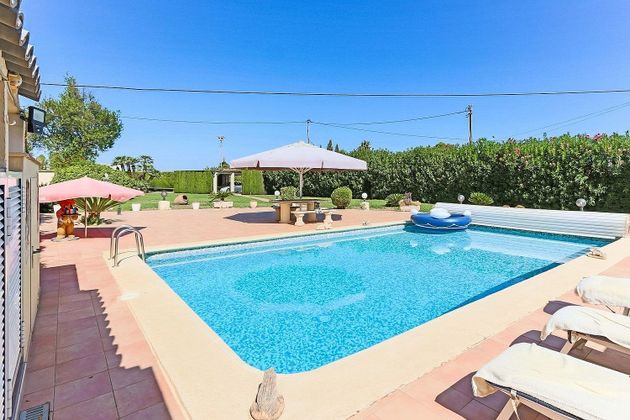 Foto 1 de Chalet en venta en Poblets (els) de 5 habitaciones con terraza y piscina