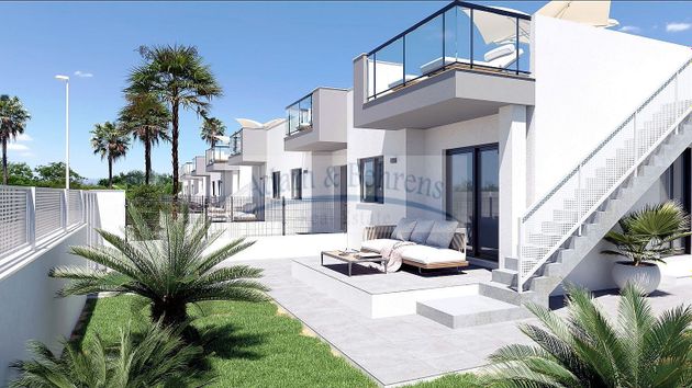 Foto 2 de Casa adossada en venda a calle Gandia de 2 habitacions amb terrassa i piscina