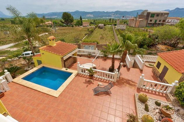 Foto 1 de Xalet en venda a Tormos de 6 habitacions amb terrassa i piscina