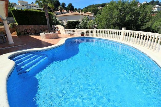 Foto 2 de Venta de casa en Pedreguer de 4 habitaciones con terraza y piscina