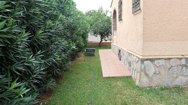 Foto 2 de Chalet en venta en Poblets (els) de 3 habitaciones con terraza y jardín