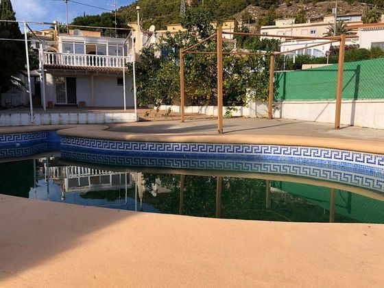Foto 1 de Casa en venta en calle Partida Canuta de Ifach de 3 habitaciones con terraza y piscina
