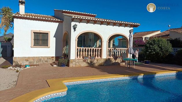 Foto 1 de Casa en venta en Tormos de 3 habitaciones con terraza y piscina