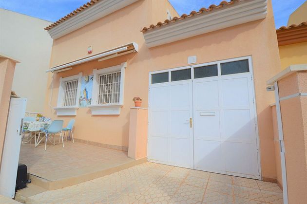 Foto 2 de Venta de casa adosada en Cabo Roig - La Zenia de 3 habitaciones con terraza y piscina