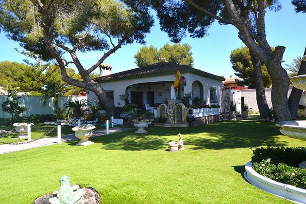 Foto 1 de Xalet en venda a Dehesa de Campoamor - La Regia - Aguamarina de 4 habitacions amb terrassa i piscina