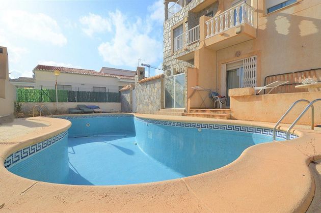 Foto 2 de Casa adosada en venta en  El Acequión - Los Naúfragos de 4 habitaciones con terraza y piscina