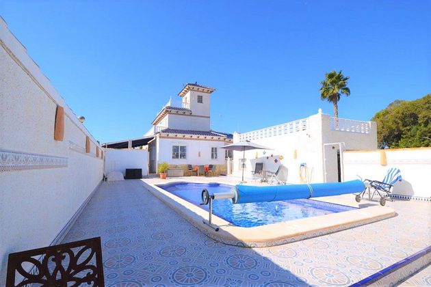 Foto 1 de Casa en venda a Dehesa de Campoamor - La Regia - Aguamarina de 3 habitacions amb terrassa i piscina