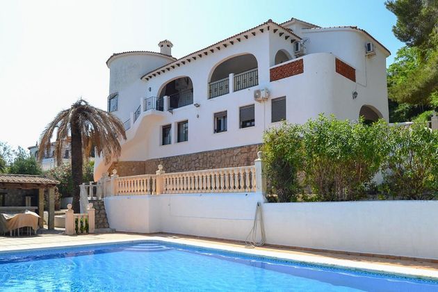 Foto 1 de Venta de casa en Pedreguer de 6 habitaciones con terraza y piscina