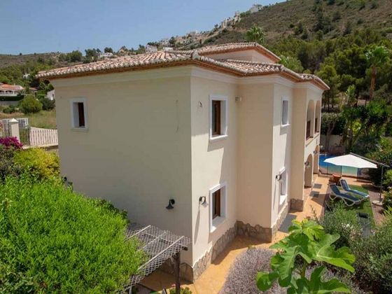 Foto 1 de Casa adossada en venda a Pinar del Advocat - Cometa de 5 habitacions amb terrassa i piscina