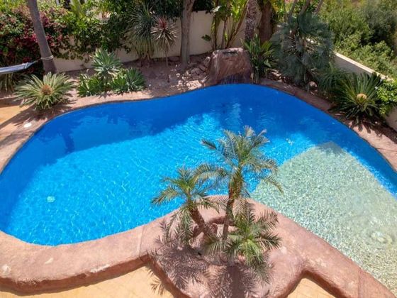 Foto 2 de Casa adossada en venda a Pinar del Advocat - Cometa de 5 habitacions amb terrassa i piscina