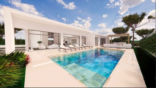 Foto 1 de Chalet en venta en calle Pinar de Campoverde de 3 habitaciones con terraza y piscina