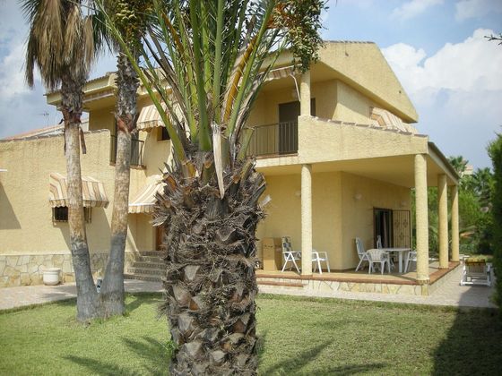 Foto 1 de Venta de chalet en Dehesa de Campoamor - La Regia - Aguamarina de 4 habitaciones con terraza y piscina